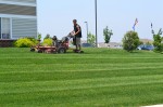 Employee Mowing Photo